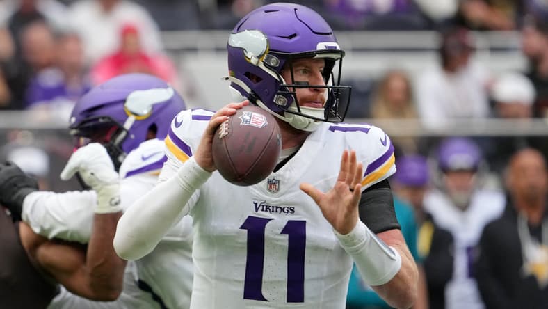 Carson Wentz drops back to pass for Vikings against Browns in London.