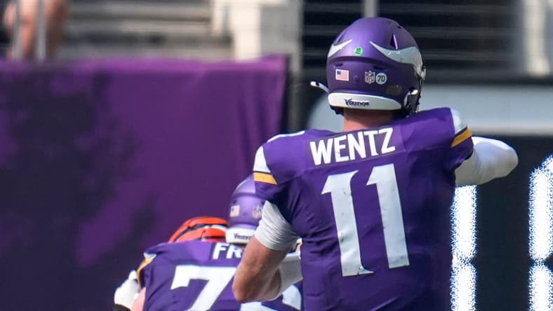 Carson Wentz throws a touchdown pass for the Minnesota Vikings against the Bengals.Vikings QB room
