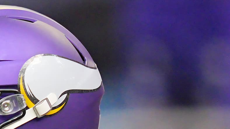 Carson Wentz warms up before a Vikings game against the Eagles at U.S. Bank Stadium.
