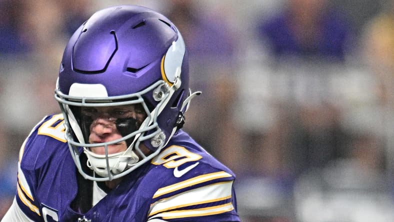 J.J. McCarthy hands off to Aaron Jones Sr. during the Vikings’ game against the Falcons at U.S. Bank Stadium.