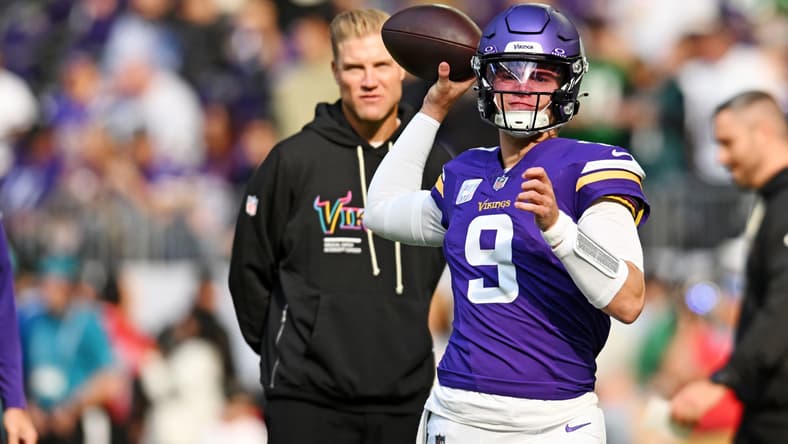 J.J. McCarthy throws passes during warmups before a Vikings game at U.S. Bank Stadium.