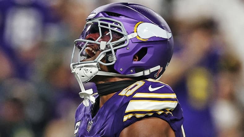 Vikings linebacker Jonathan Greenard celebrates after a sack against the Falcons during second-half action.