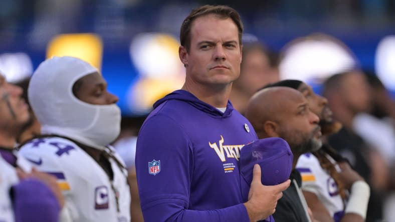 Kevin O’Connell watches from the sideline during a Vikings game against the Chargers