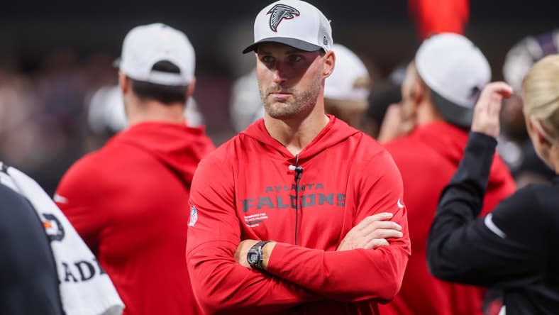 Kirk Cousins with the Atlanta Falcons on the sidelines in 2025