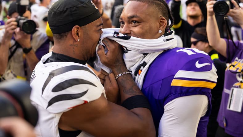 Ja’Marr Chase and Justin Jefferson hug after a game at U.S. Bank Stadium.