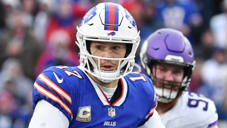 Josh Allen runs for a first down during a Bills game against the Vikings at Highmark Stadium. cheapest Vikings tickets