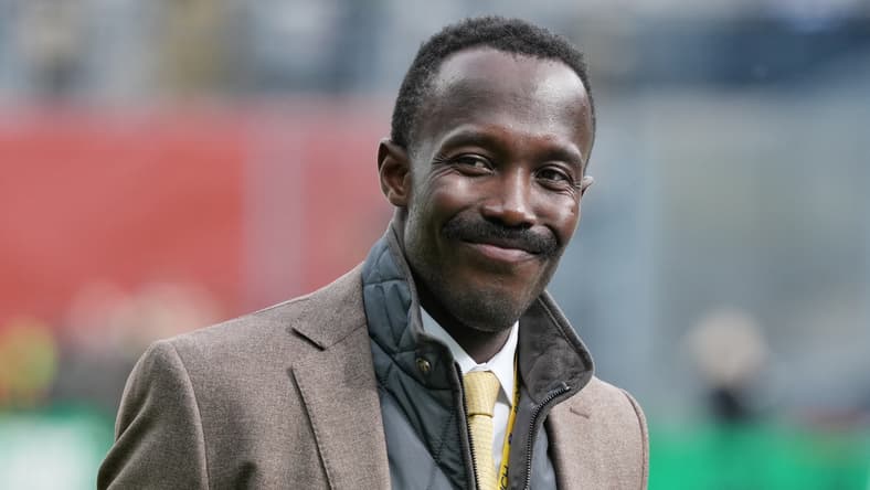 Kwesi Adofo-Mensah standing on the sideline during a Vikings International Series game at Croke Park in Dublin.