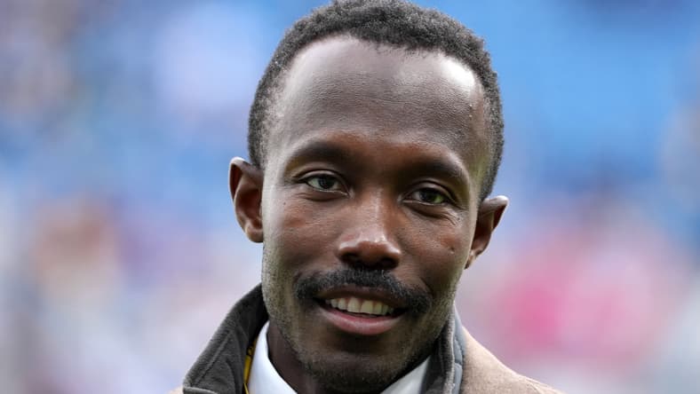 Kwesi Adofo-Mensah standing on the sideline during Vikings game at Croke Park.