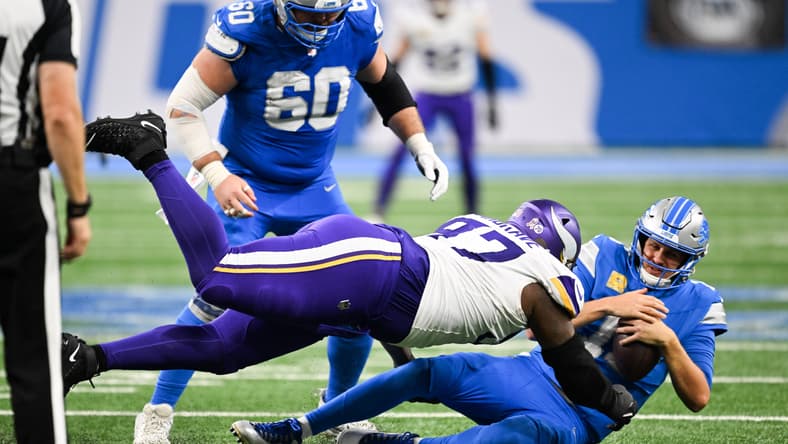 Javon Hargrave sacks Jared Goff during the third quarter of the Vikings’ divisional game against the Lions.