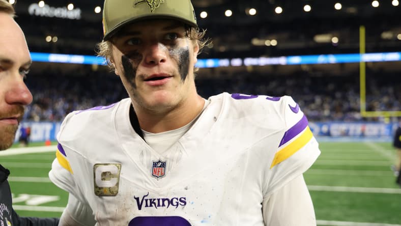 J.J. McCarthy walking off field after Vikings game at Ford Field
