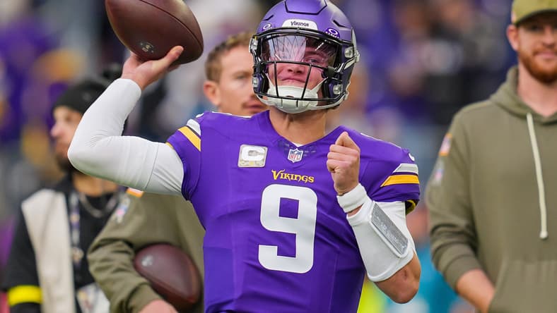 J.J. McCarthy warms up before facing the Baltimore Ravens at U.S. Bank Stadium on November 9, 2025.