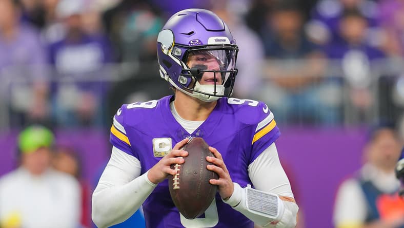 Vikings quarterback J.J. McCarthy drops back to pass against the Ravens at U.S. Bank Stadium.