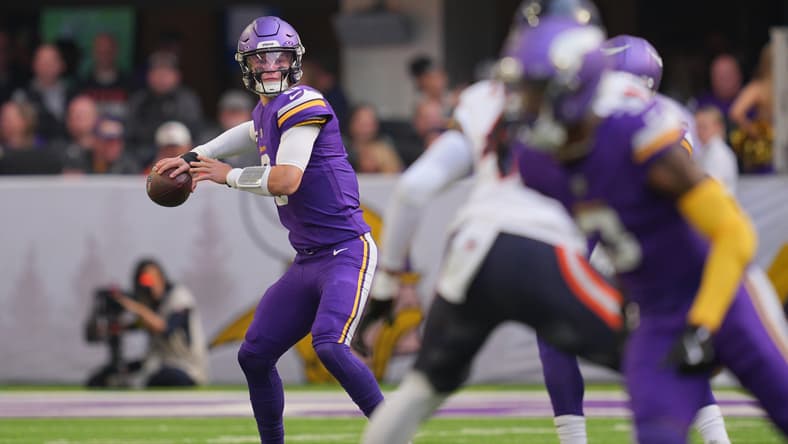 J.J. McCarthy throws a pass during a Vikings home game against the Bears.