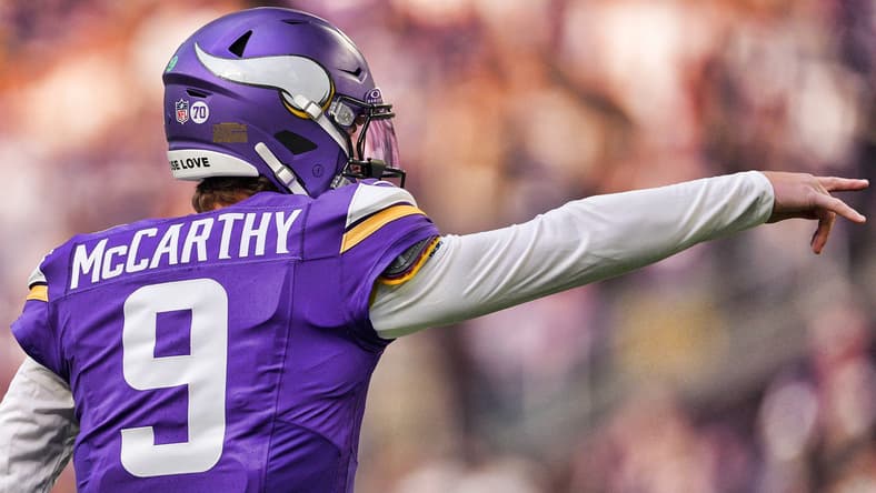 J.J. McCarthy stands on the field during a Vikings game at U.S. Bank Stadium in Minneapolis.