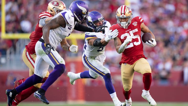 San Francisco 49ers running back Eli Mitchell runs the ball against Vikings linebacker Eric Kendricks at Levi’s Stadium. Vikings 49ers Mexico City