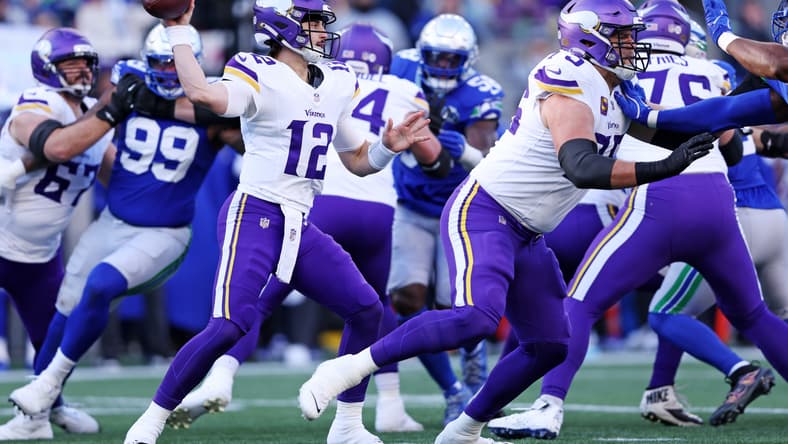 Vikings quarterback Max Brosmer drops back to pass against the Seattle Seahawks at Lumen Field.
