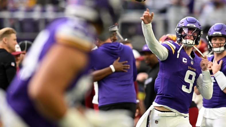 Minnesota Vikings quarterback J.J. McCarthy practices before a game at U.S. Bank Stadium. Vikings rumors