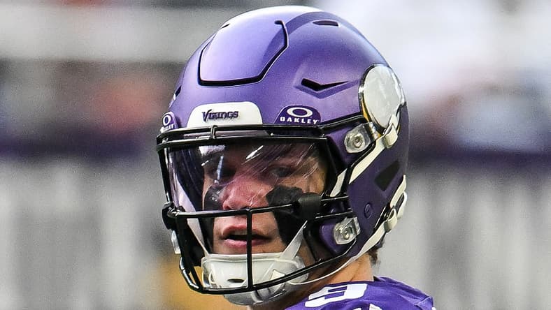 Vikings quarterback J.J. McCarthy drops back to pass at U.S. Bank Stadium.