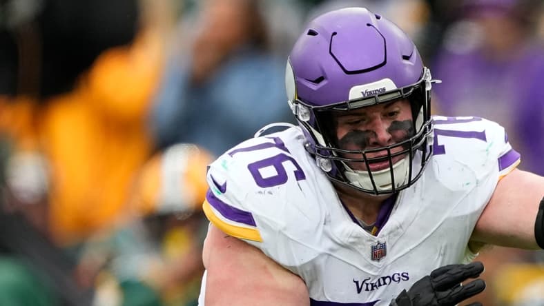 Micah Parsons rushes past Vikings guard Will Fries during a Packers game. Vikings predictions 2026