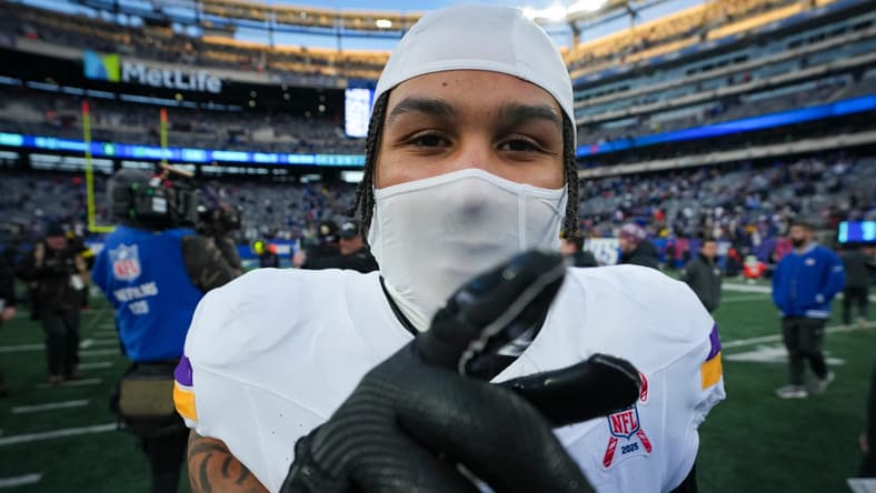 Jalen Nailor pointing on the field after a Vikings game against the Giants