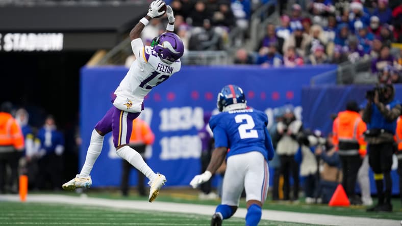 Tai Felton catches a pass while defended by Deonte Banks at MetLife Stadium.