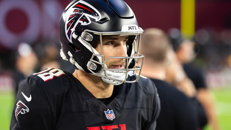 Falcons quarterback Kirk Cousins in the pocket during a road game against the Cardinals at State Farm Stadium.