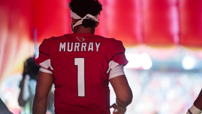 Kyler Murray preparing for a play against the Lions at State Farm Stadium