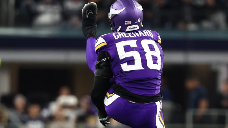 Jonathan Greenard celebrates with Vikings linebackers Eric Wilson and Andrew van Ginkel after a defensive play against the Dallas Cowboys.