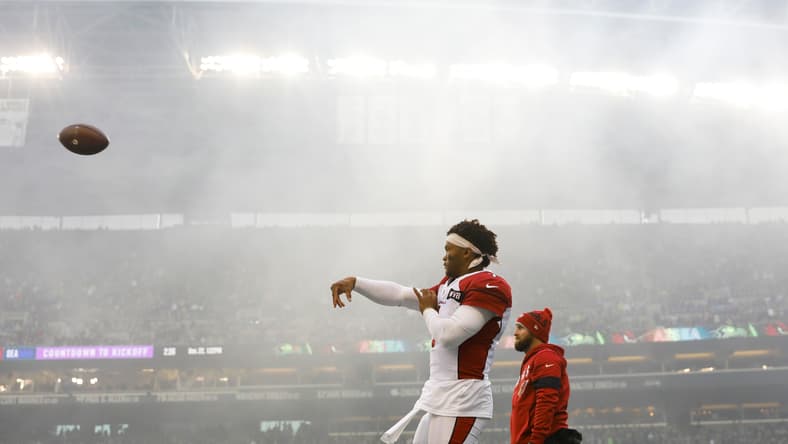 Kyler Murray warms up before a Cardinals road game against the Seahawks at CenturyLink Field.