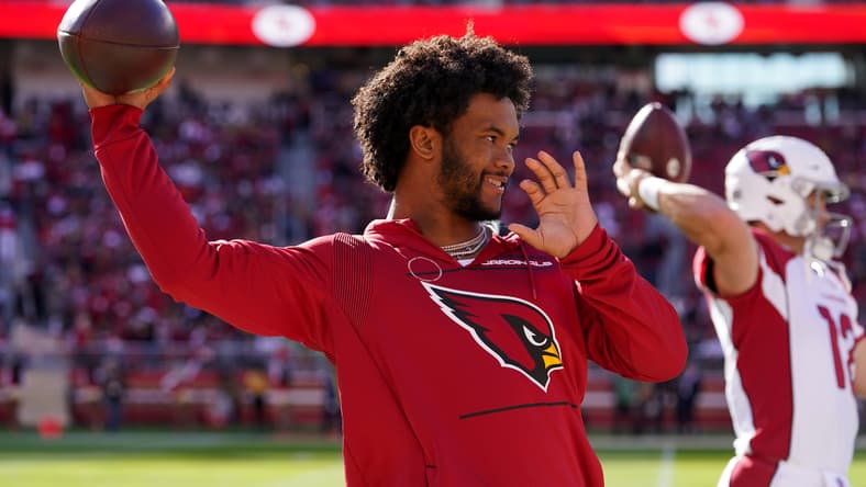 Kyler Murray throws near the sideline before a Cardinals-49ers game.