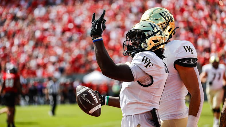 Wake Forest running back Demond Claiborne celebrates a touchdown against North Carolina State. Vikings offseason predictions
