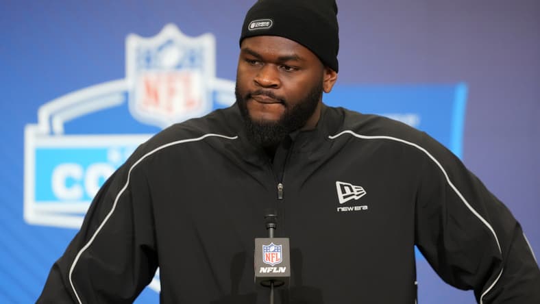 Caleb Banks speaking to media at the NFL Scouting Combine in Indianapolis.