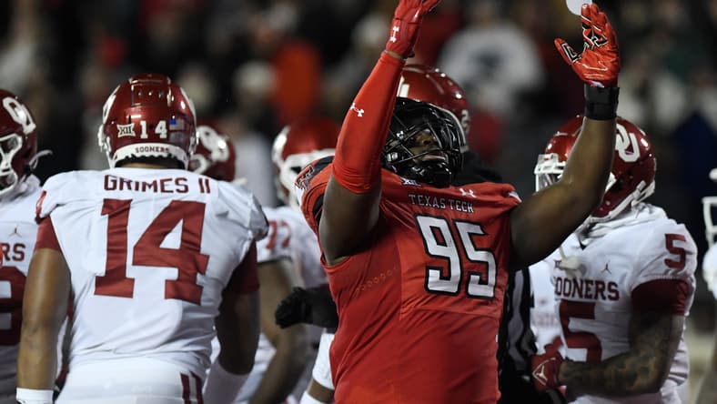Jaylon Hutchings celebrates after scoring a touchdown for Texas Tech against Oklahoma.