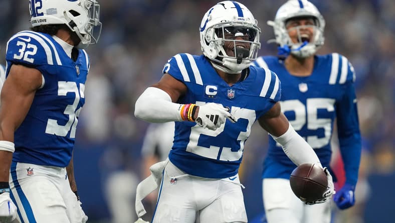 Kenny Moore II celebrates after an interception during a game against the Rams at Lucas Oil Stadium.