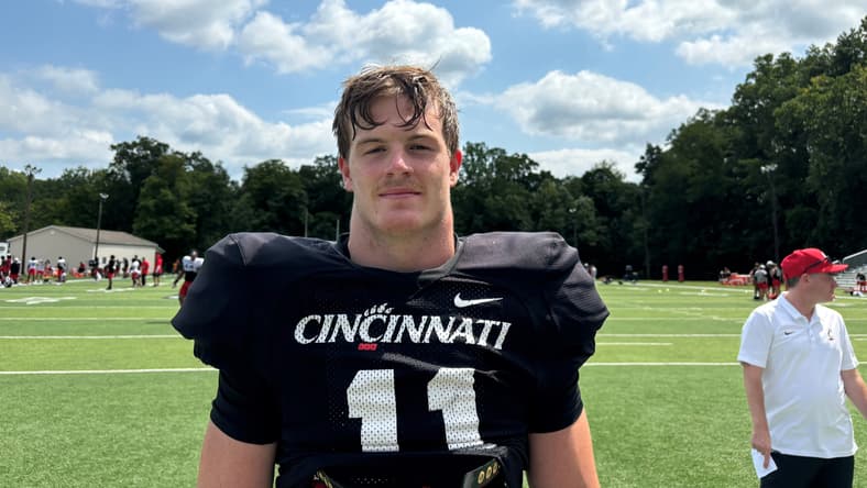 Jake Golday poses as a Cincinnati Bearcats linebacker after transferring from Central Arkansas.