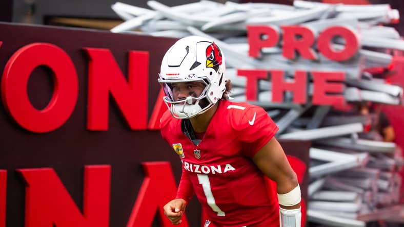 Kyler Murray scans the field during a home game against the Washington Commanders at State Farm Stadium.