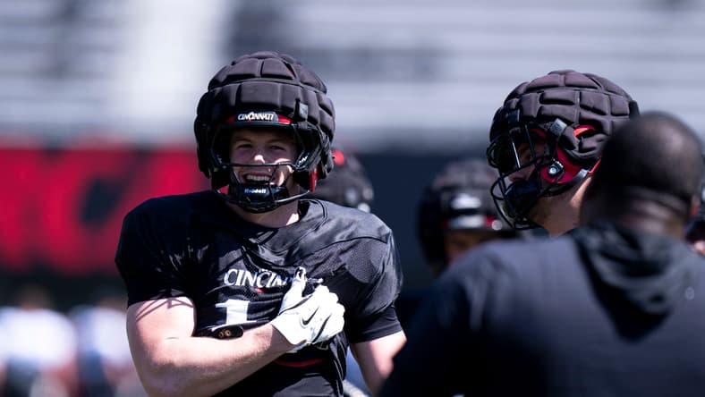 Jake Golday smiles during Cincinnati Bearcats spring football practice at Nippert Stadium. Jake Golday