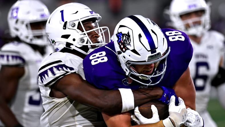 Charles Demmings attempts a tackle against Abilene Christian.