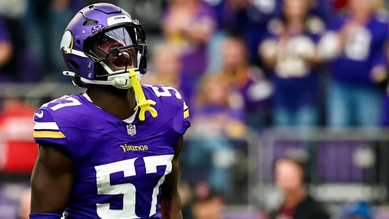 Jamin Davis celebrates a defensive play during his time with the Vikings