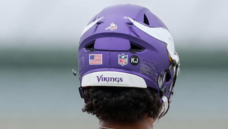 Kyler Murray put on his helmet during Minnesota Vikings organized team activities in Eagan. Vikings win total
