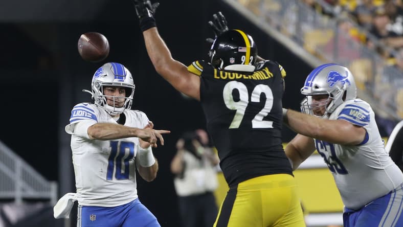 Isaiahh Loudermilk pressures Lions quarterback David Blough during a preseason game at Heinz Field.