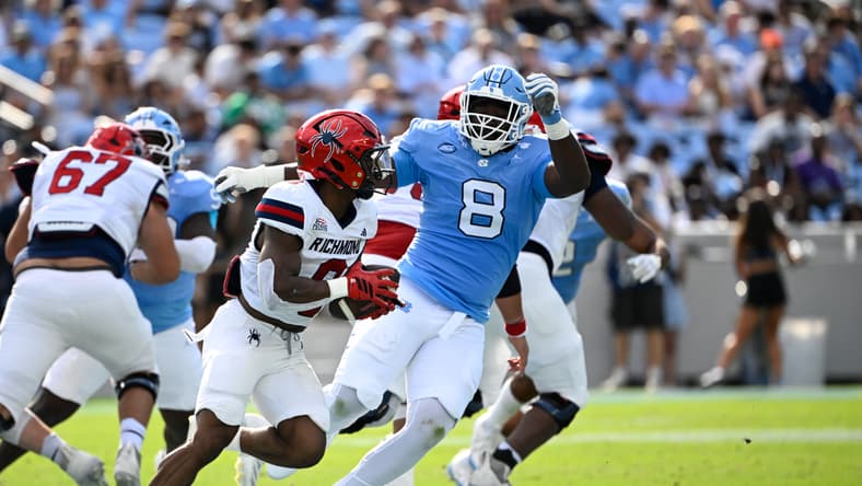 Smith Vilbert defends against Andrew King during North Carolina's game against Richmond at Kenan Stadium. Vikings roster