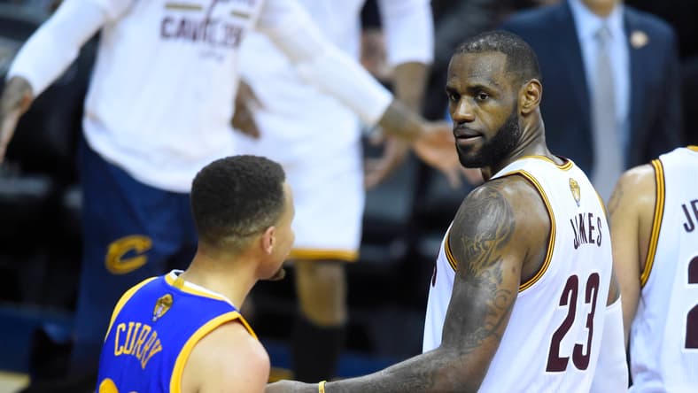 LeBron James looks toward Stephen Curry during Game 6 of the 2016 NBA Finals between the Cavaliers and Warriors. Jauan Jennings
