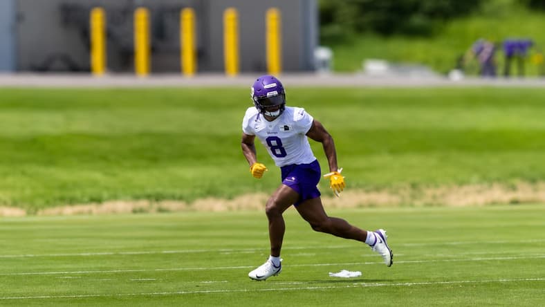 Jakobe Thomas runs through Vikings minicamp practice in Eagan.