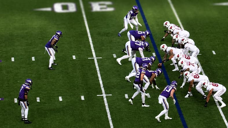 Kyler Murray surveys the Vikings defense during an Arizona Cardinals offensive snap. Vikings contract extensions