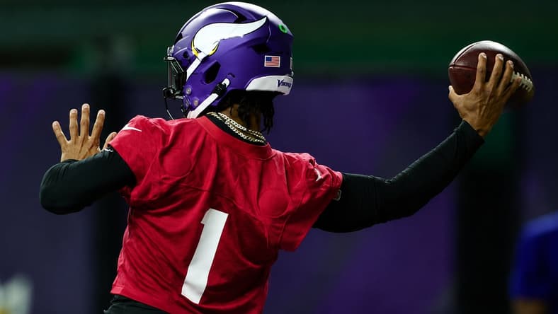 Minnesota Vikings quarterback Kyler Murray throws a pass during minicamp practice.