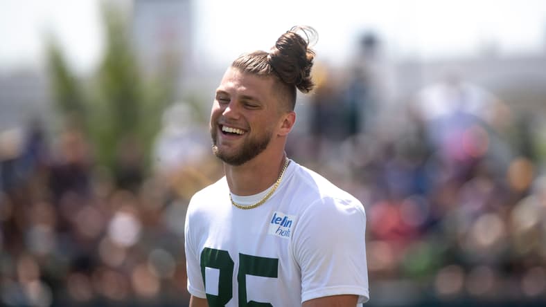Robert Tonyan laughs during Packers training camp practice.