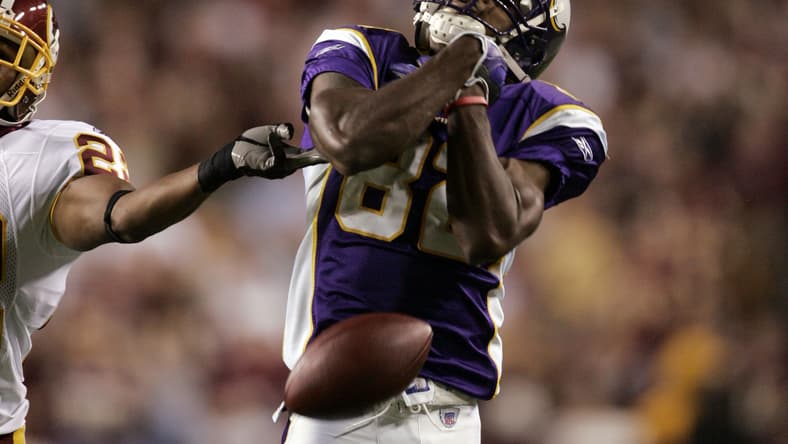 Troy Williamson attempts a catch against Washington during a road game at FedEx Field. Vikings draft busts