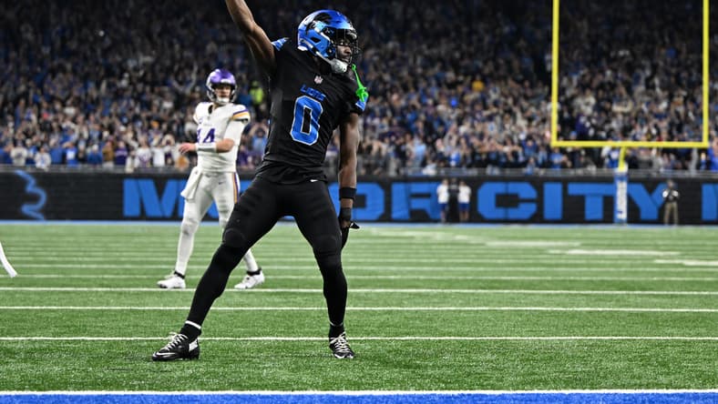 Detroit Lions cornerback Terrion Arnold celebrates after breaking up a pass against the Minnesota Vikings.