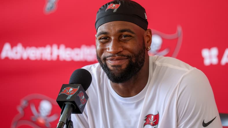 Haason Reddick speaks to reporters after a Buccaneers training camp practice in Tampa.